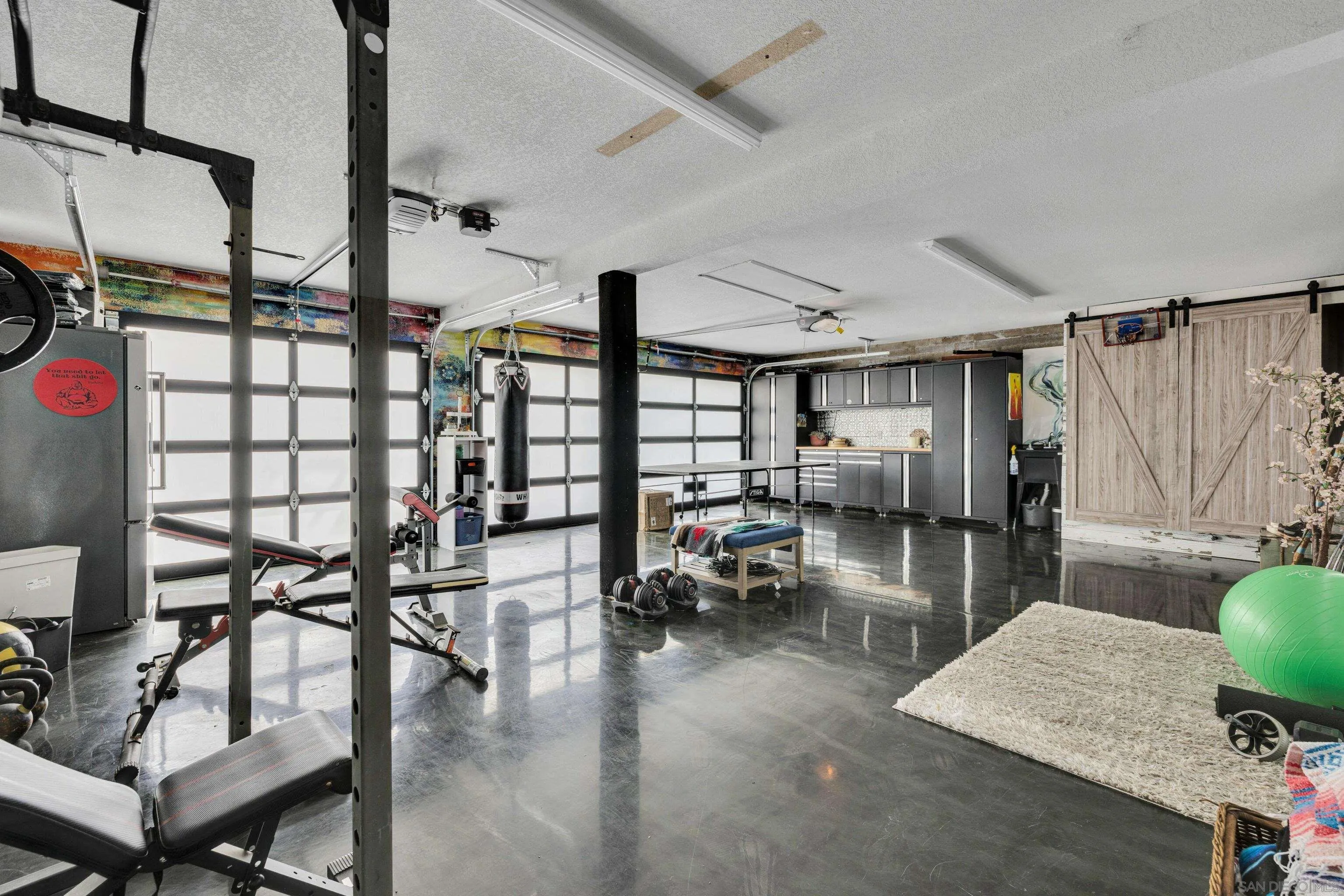 37389 Ave Chapala Temecula, CA 92592 - Photo 33 of 68 a living room with lots of furniture and a wooden floor