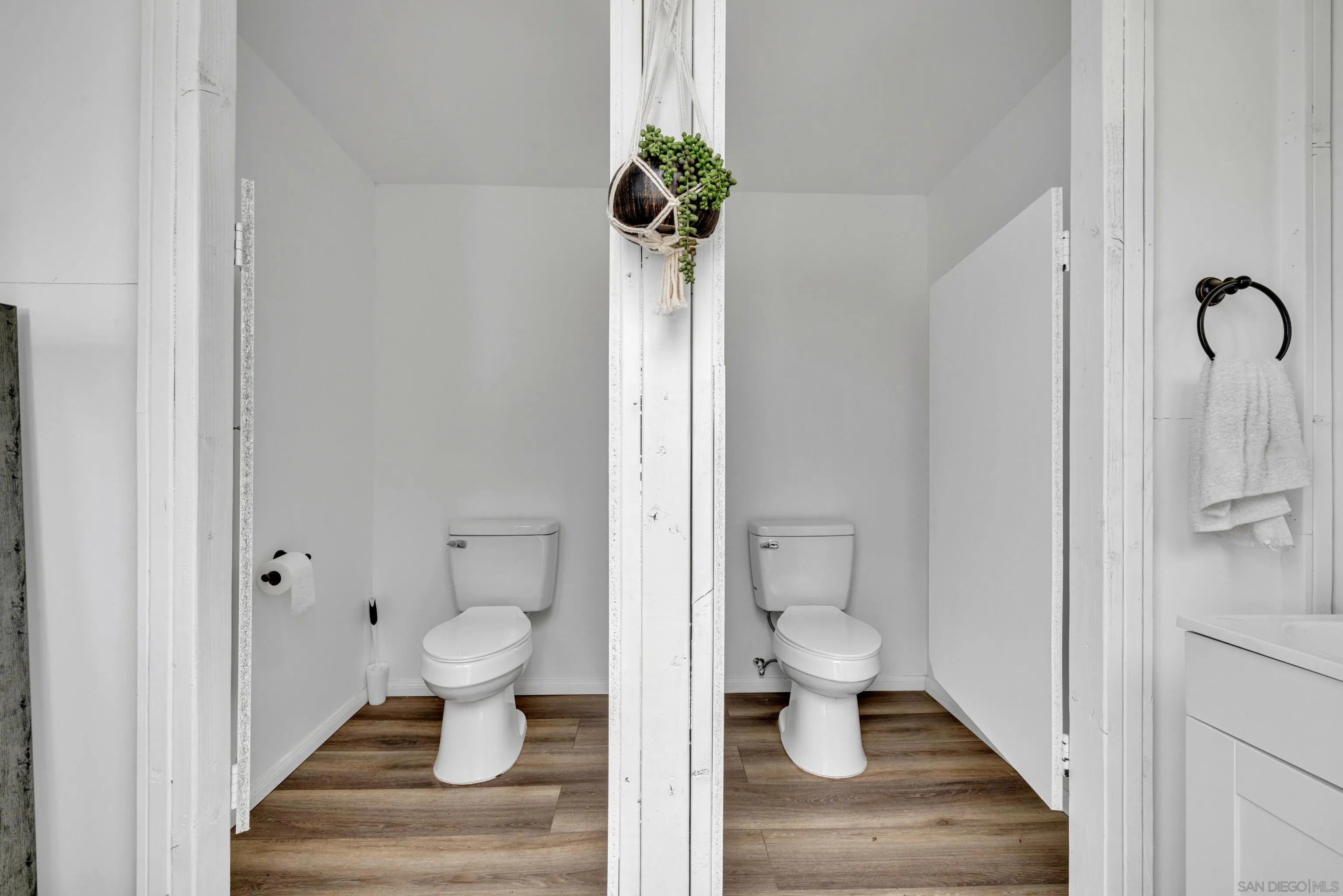 37389 Ave Chapala Temecula, CA 92592 - Photo 43 of 68 a bathroom with a toilet and a view of a bathroom