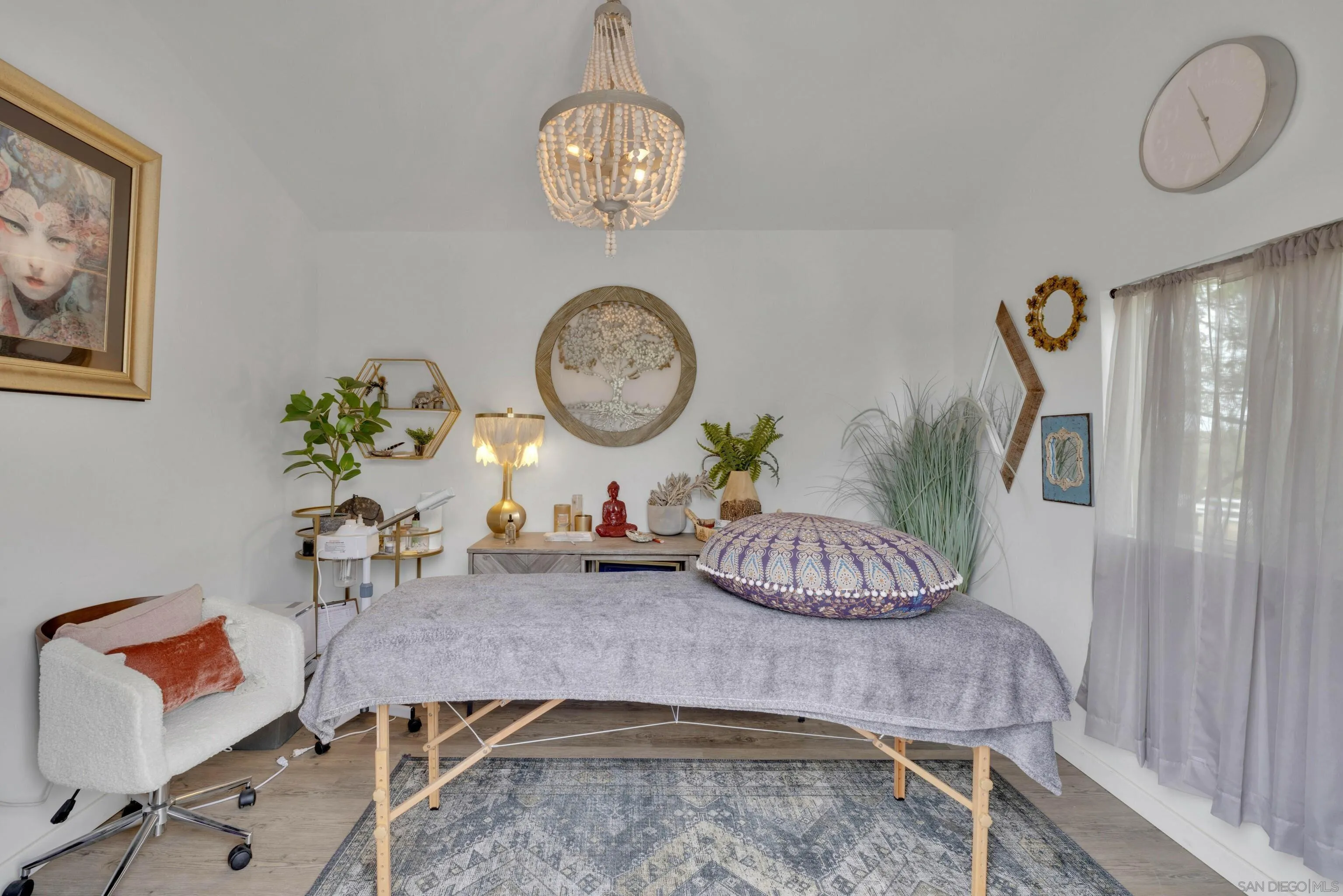 37389 Ave Chapala Temecula, CA 92592 - Photo 50 of 68 a living room with furniture and a chandelier