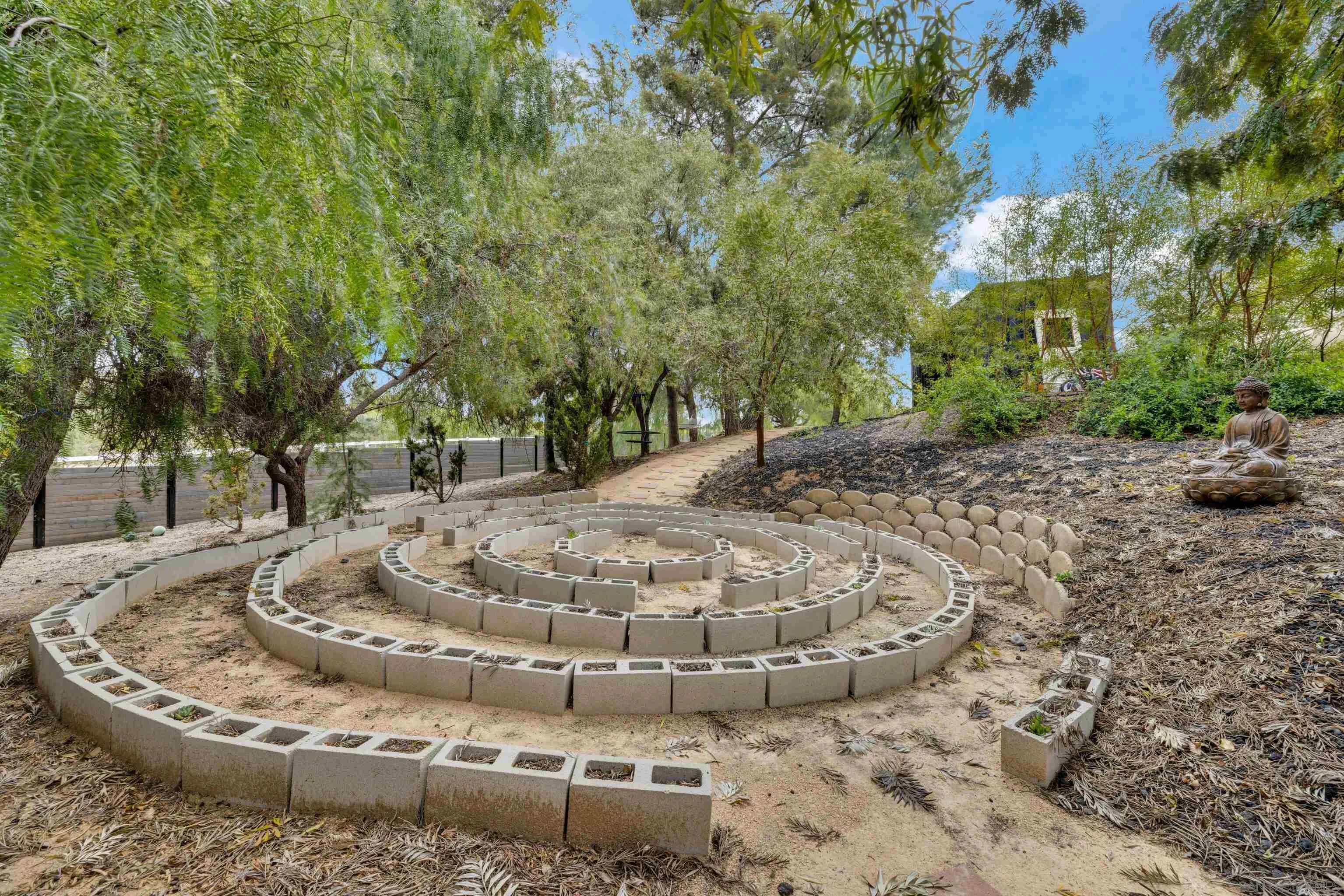 37389 Ave Chapala Temecula, CA 92592 - Photo 54 of 68 a view of a wooden house with a yard