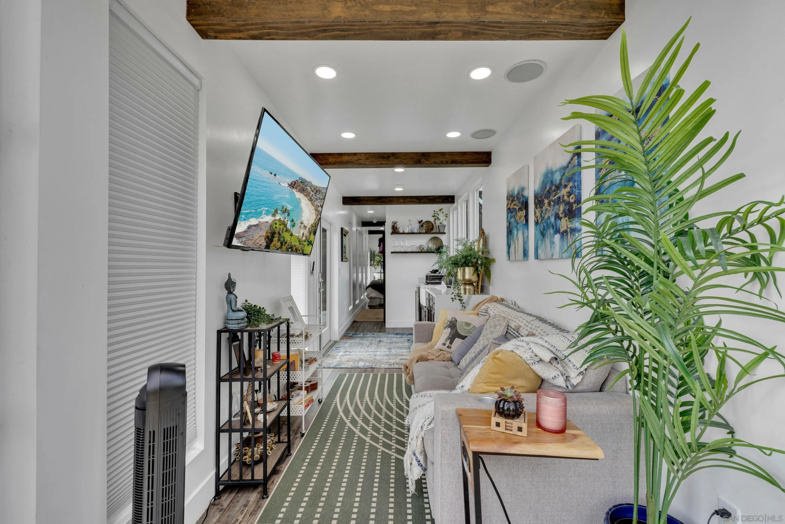 37389 Ave Chapala Temecula, CA 92592 - Photo 62 of 68 a living room with furniture potted plant and a rug