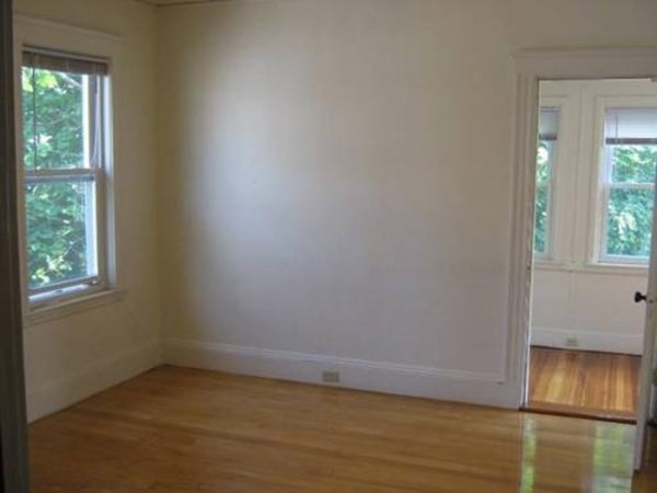 28 Commonwealth Road, Unit 2 Watertown, MA 02472 - Photo 8 of 10 an empty room with a window