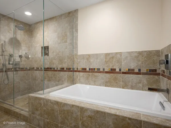 a view of a bathtub in a bathroom
