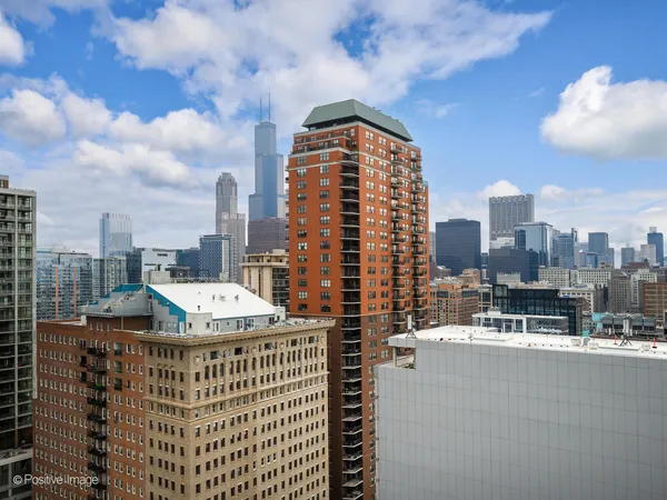 a view of a city with tall buildings