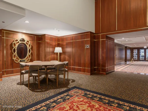 a living room with a rug