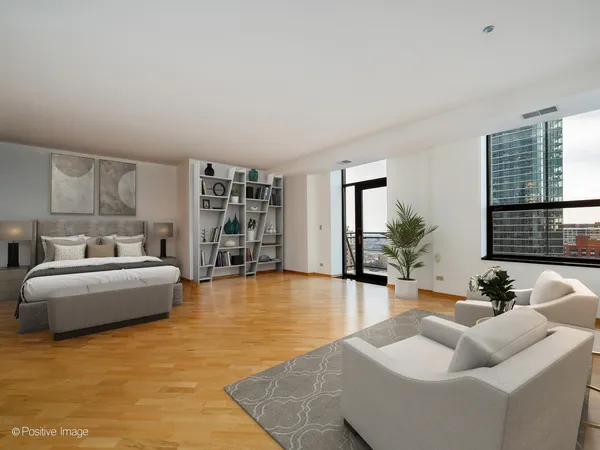 a living room with furniture and large windows