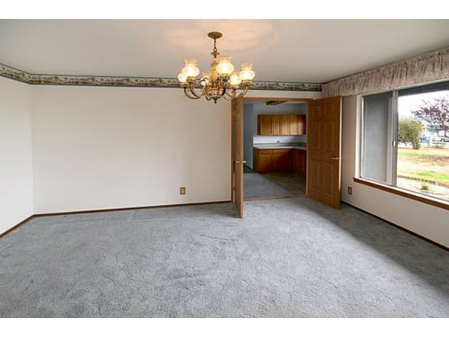 76 Whiting Road Watsonville, CA 95076 - Photo 5 of 11 a view of a livingroom with a chandelier