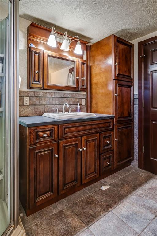 885 Black Road Volant, PA 16156 - Photo 12 of 24 a bathroom with a sink a vanity and a mirror