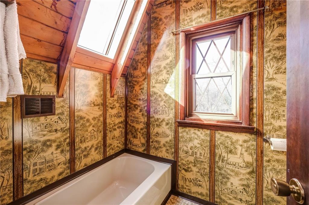 885 Black Road Volant, PA 16156 - Photo 15 of 24 a view of bathroom with bathtub and shower