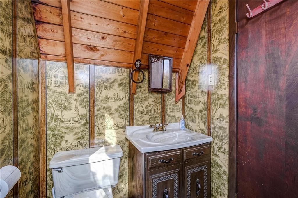 885 Black Road Volant, PA 16156 - Photo 16 of 24 a bathroom with a sink and a mirror