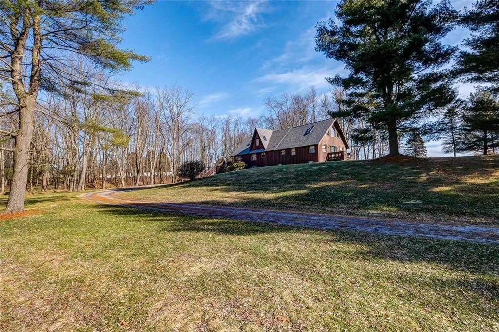 885 Black Road Volant, PA 16156 - Photo 20 of 24 a view of swimming pool with an outdoor space and seating area