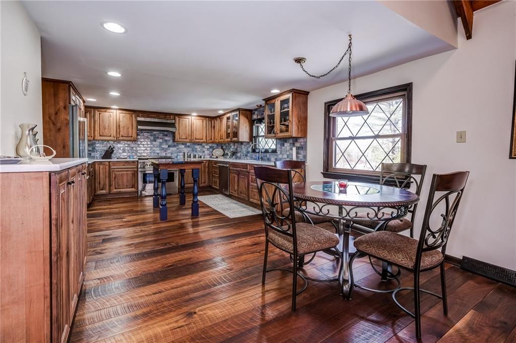 885 Black Road Volant, PA 16156 - Photo 5 of 24 a dining room with furniture window and wooden floor