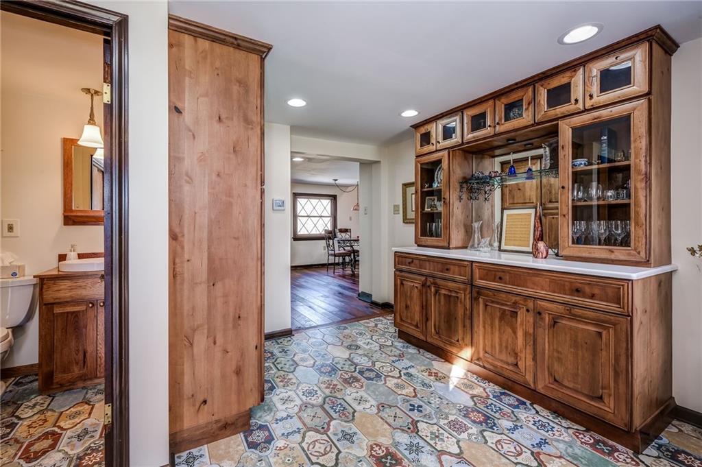 885 Black Road Volant, PA 16156 - Photo 8 of 24 a large room with wooden floor and furniture