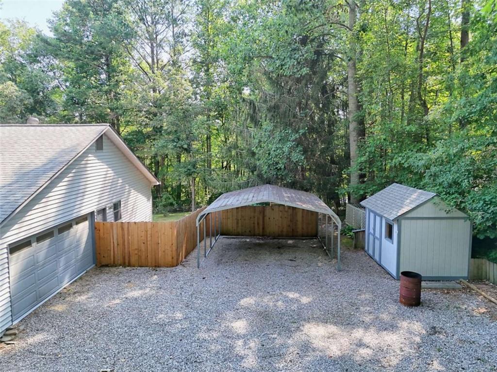 28 Coon Tail Road Blairsville, GA 30512 - Photo 2 of 100 a view of a house with a yard and roof