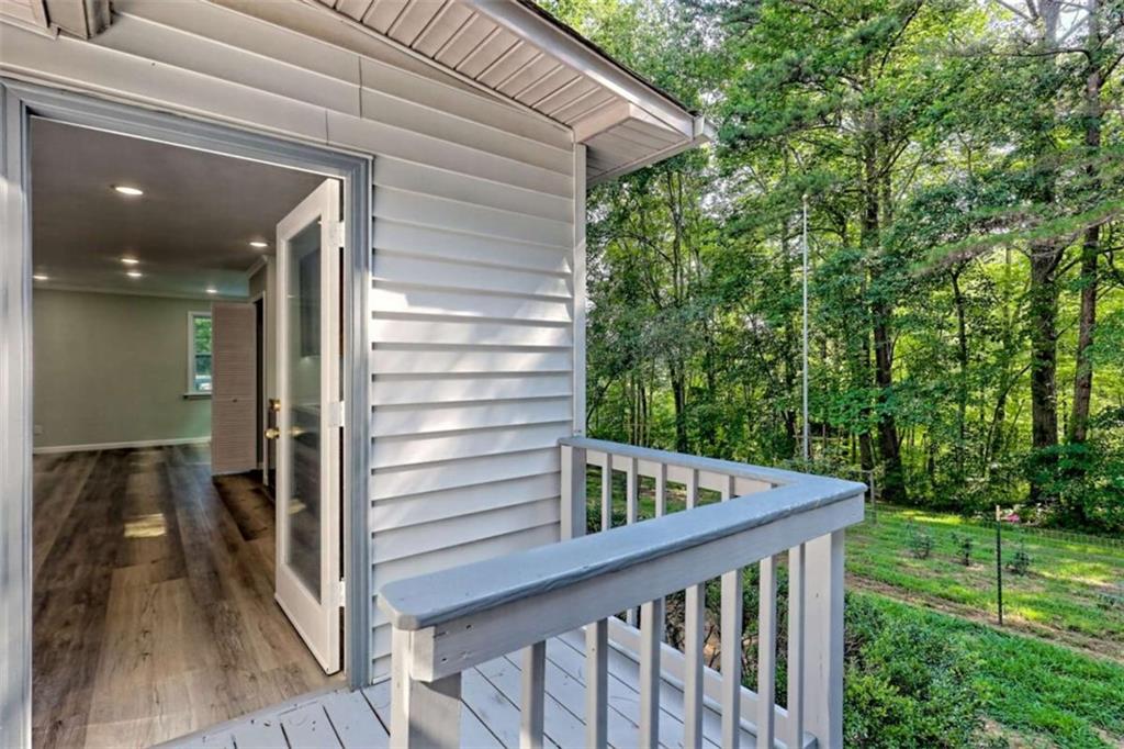 28 Coon Tail Road Blairsville, GA 30512 - Photo 38 of 100 a view of balcony with wooden floor and fence