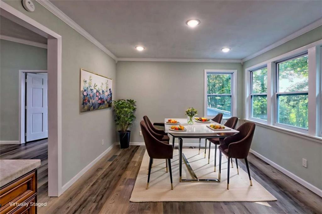 28 Coon Tail Road Blairsville, GA 30512 - Photo 42 of 100 a view of a dining room with furniture window and wooden floor