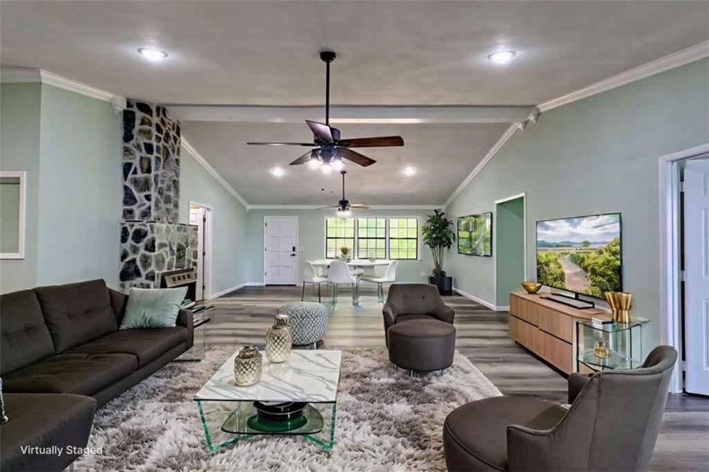 28 Coon Tail Road Blairsville, GA 30512 - Photo 45 of 100 a living room with furniture ceiling fan and a window