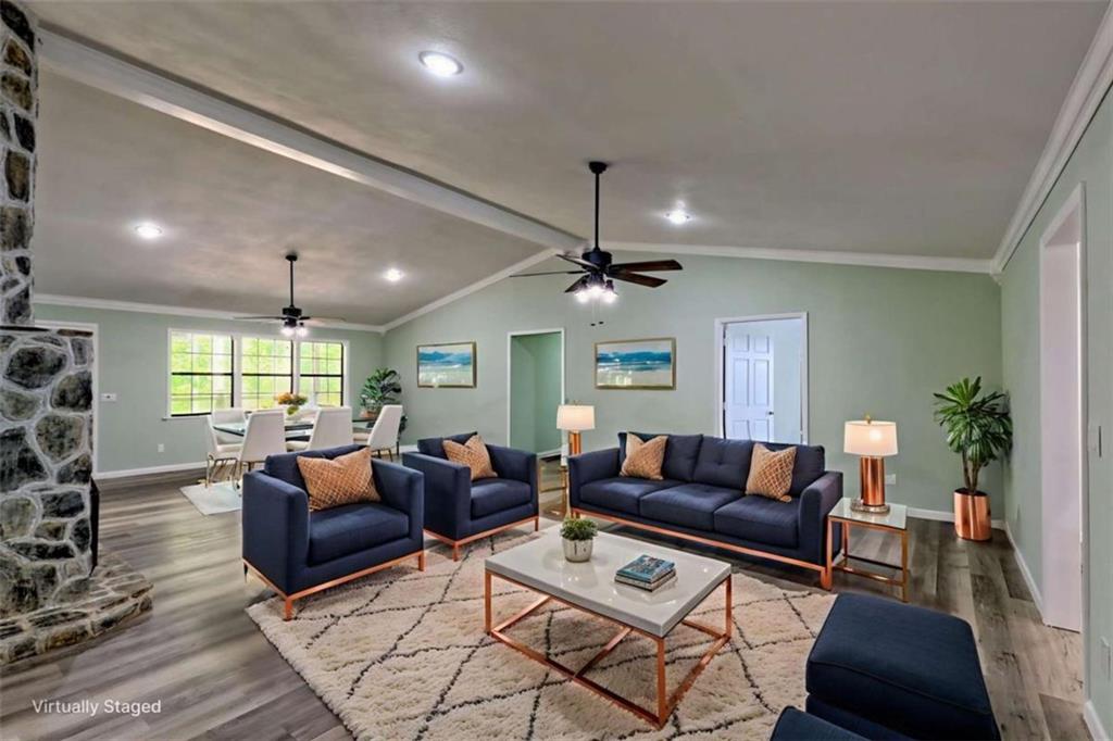 28 Coon Tail Road Blairsville, GA 30512 - Photo 47 of 100 a living room with furniture a large window and a table