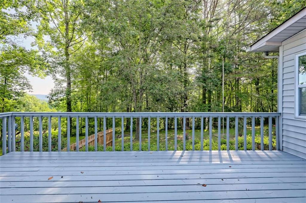 28 Coon Tail Road Blairsville, GA 30512 - Photo 52 of 100 a view of balcony with wooden floor and fence
