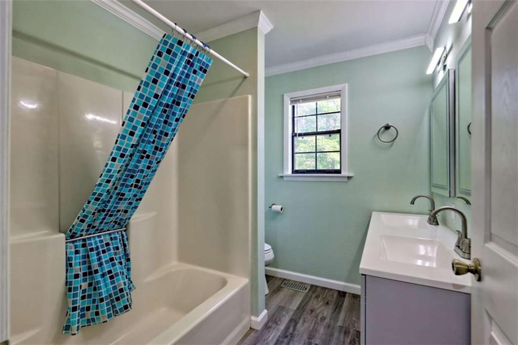 28 Coon Tail Road Blairsville, GA 30512 - Photo 68 of 100 a bathroom with a tub sink and mirror