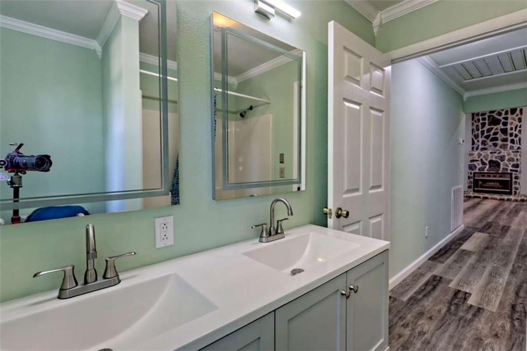 28 Coon Tail Road Blairsville, GA 30512 - Photo 69 of 100 a bathroom with a sink and a mirror