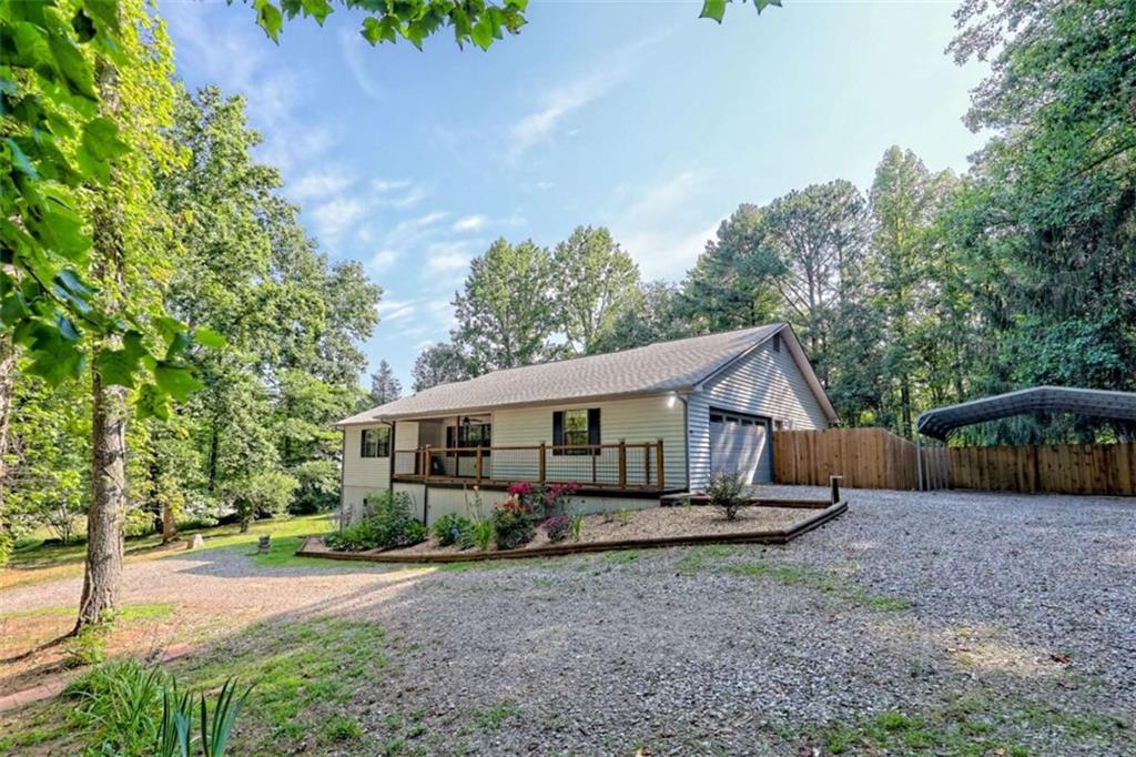 28 Coon Tail Road Blairsville, GA 30512 - Photo 9 of 100 a view of a house with backyard and trees