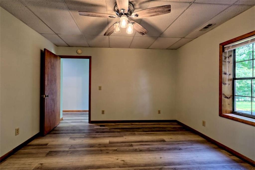28 Coon Tail Road Blairsville, GA 30512 - Photo 94 of 100 a view of room with window and wooden floor
