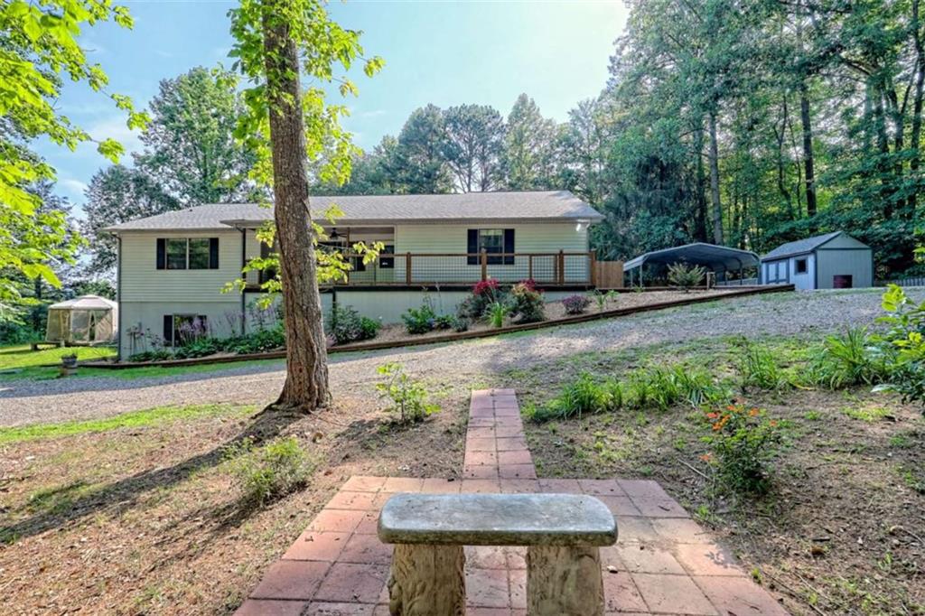 28 Coon Tail Road Blairsville, GA 30512 - Photo 10 of 100 a front view of a house with garden
