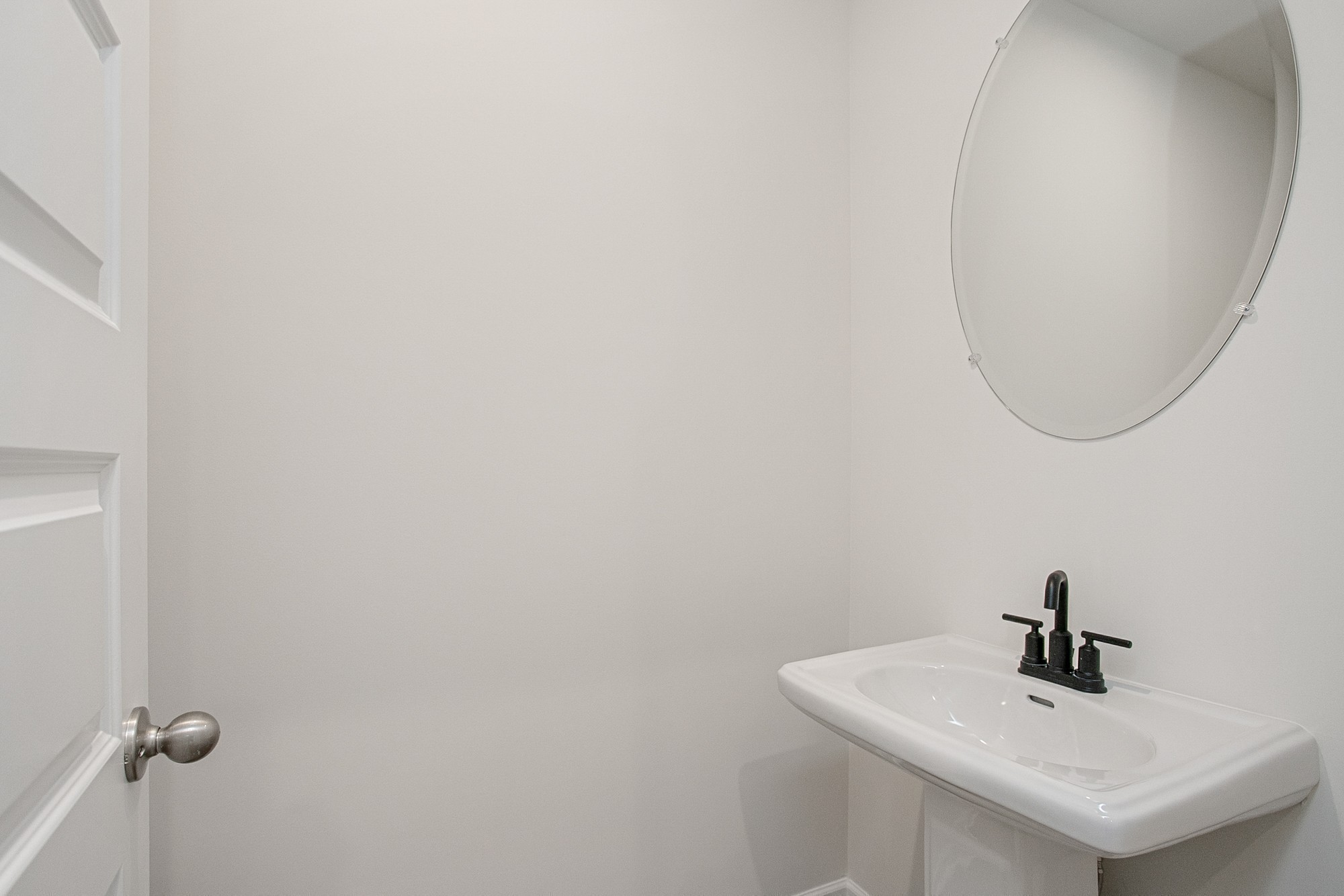 1304 Godwin Road Hermitage, TN 37076 - Photo 5 of 28 a bathroom with a sink and mirror
