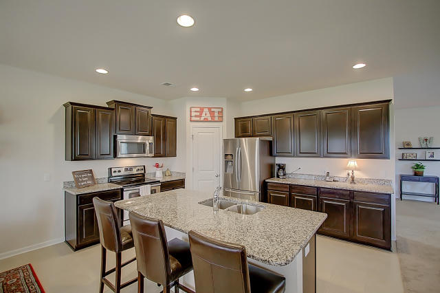 337 Iveson Road Summerville, SC 29486 - Photo 9 of 34 Kitchen has Granite and Stainless Steel