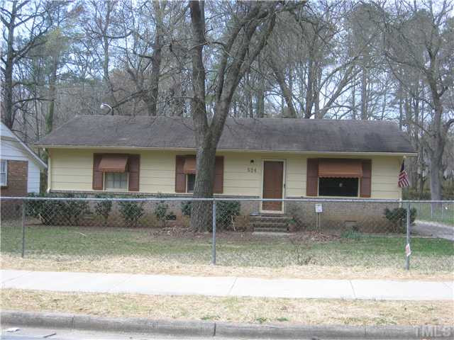 524 Dacian Road Raleigh, NC 27610 - Photo 1 of 5 a front view of a house with garden and plants