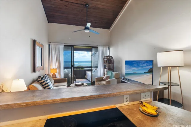 a kitchen with a sink and a counter top space