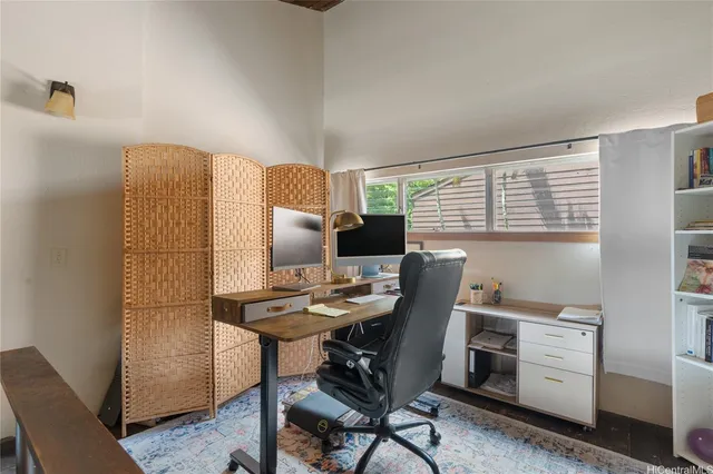 a workspace with furniture and lamp