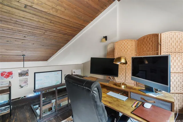 a room with furniture and flat screen tv