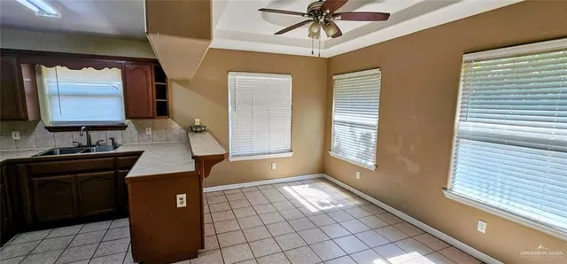 a view of a hallway with a chandelier