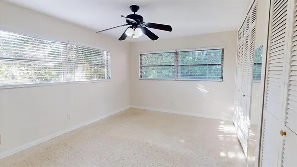 a bathroom with a shower and a mirror