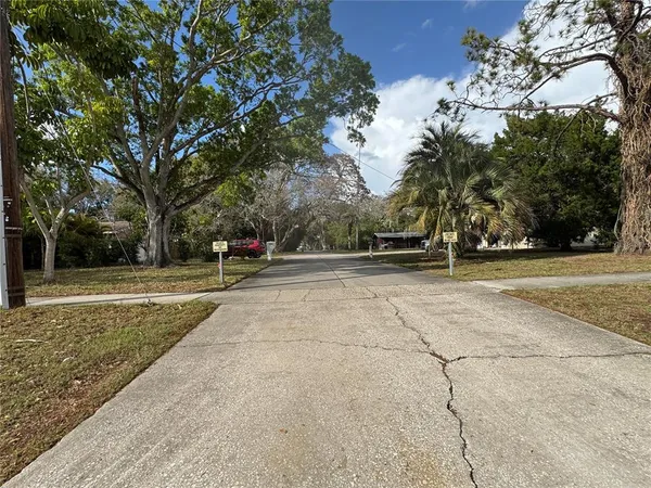 a view of road with trees