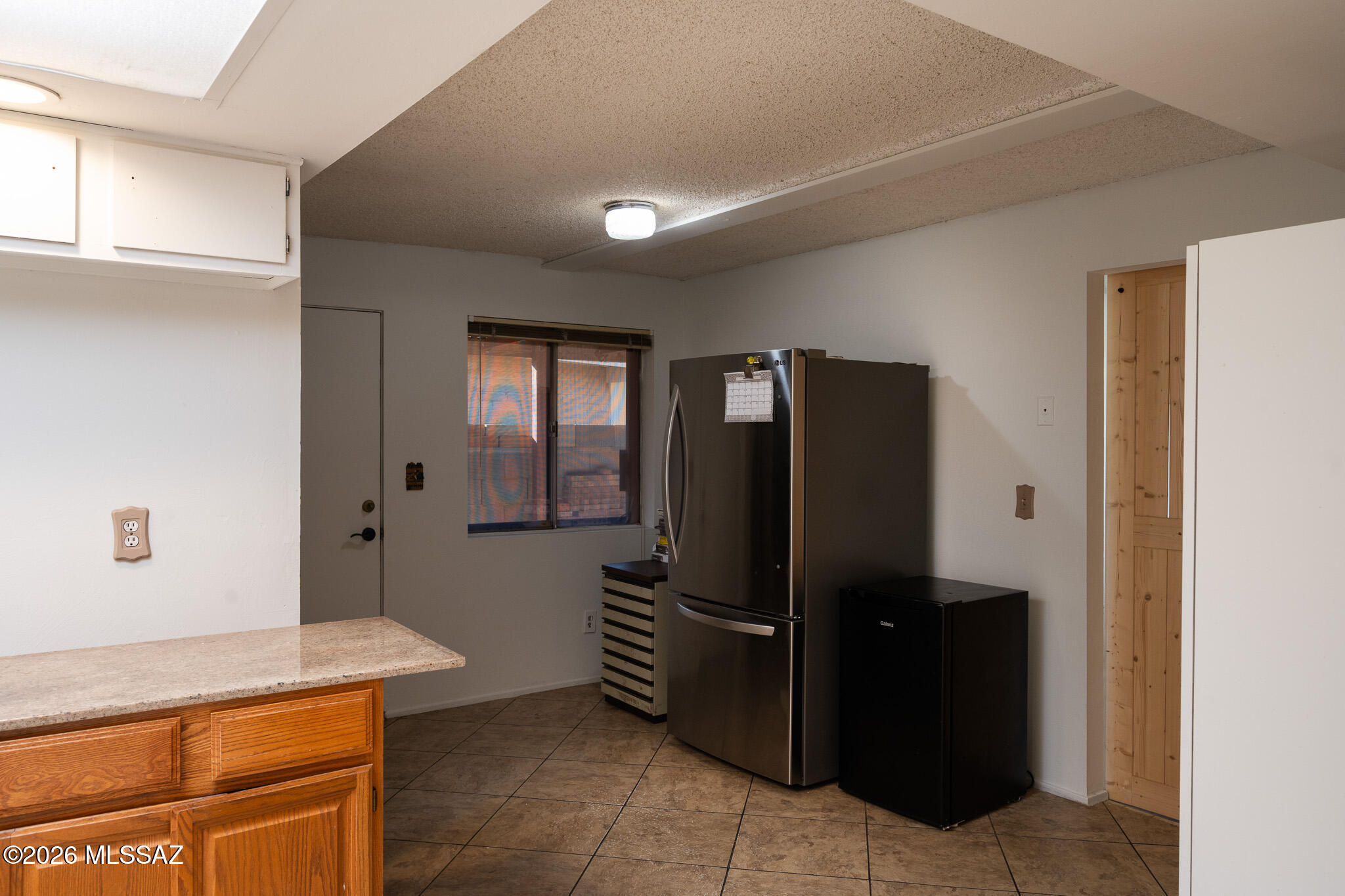 7749 East Pima Street Tucson, AZ 85715 - Photo 4 of 21 Kitchen nook DSC_4732