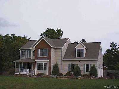 8441 Cattail Road Chesterfield, VA 23838 - Photo 1 of 1 front view of a house with a garden