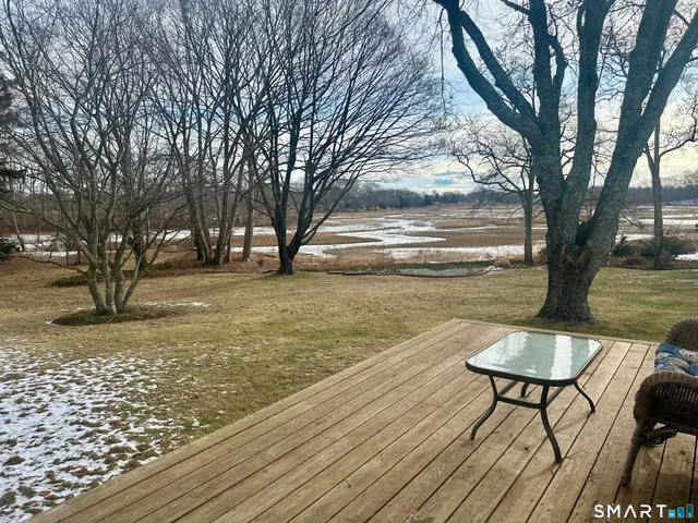 a view of a lake with a bench