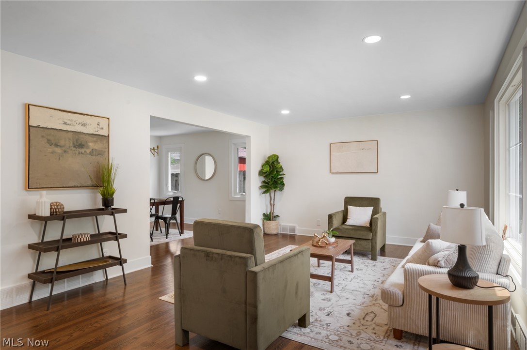 22625 Rye Road Shaker Heights, OH 44122 - Photo 4 of 38 Spacious living room featuring wood-finish flooring, recessed lighting, and large windows providing ample natural light