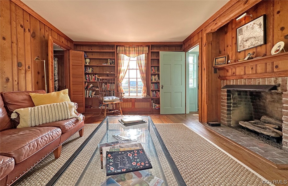 616 Main Street Reedville, VA 22539 - Photo 11 of 30 a living room with furniture and a fireplace
