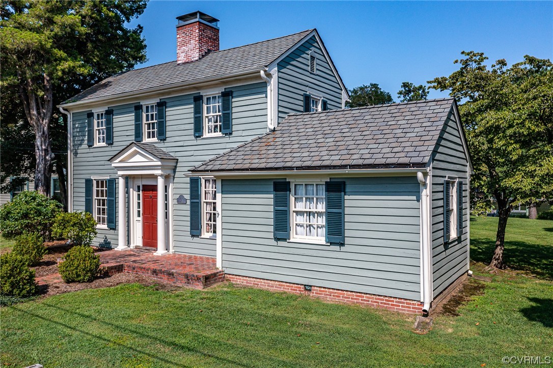 616 Main Street Reedville, VA 22539 - Photo 25 of 30 a front view of a house with a yard