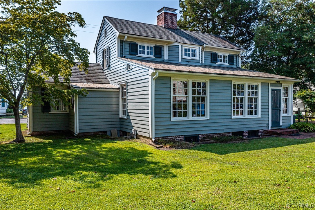 616 Main Street Reedville, VA 22539 - Photo 26 of 30 a view of a house with a yard