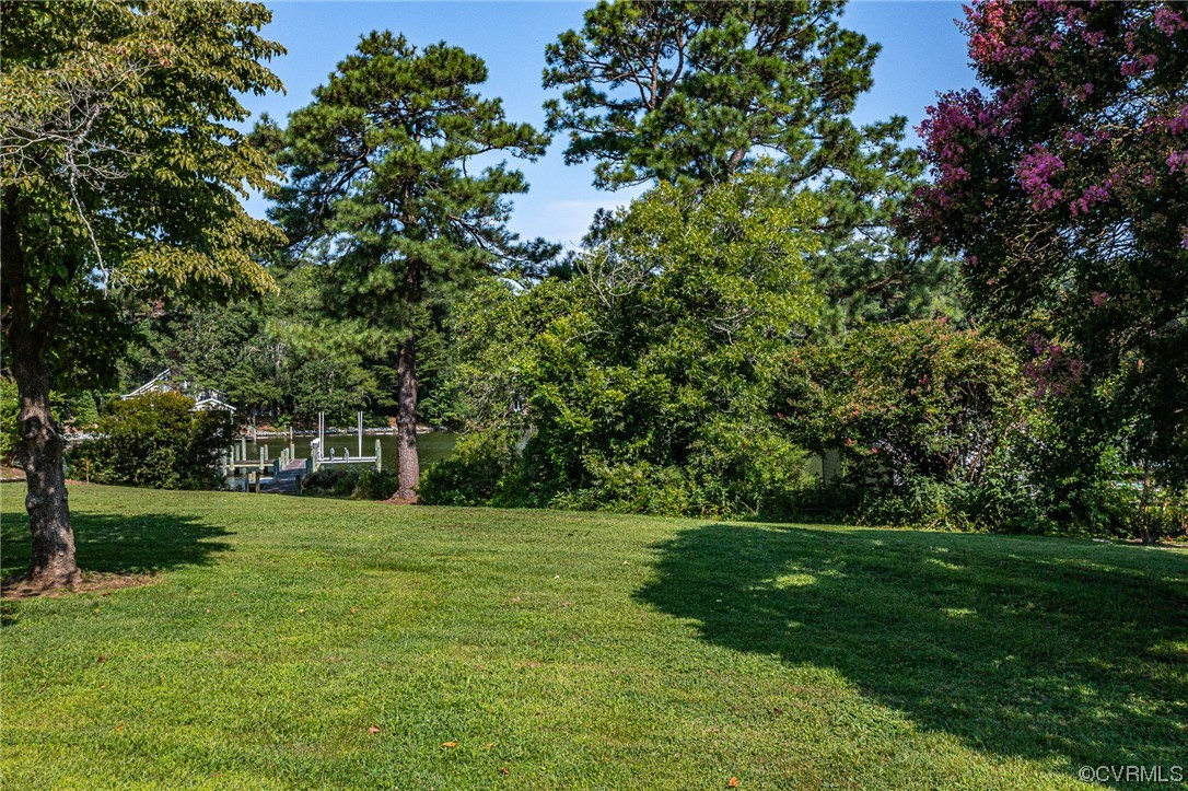 616 Main Street Reedville, VA 22539 - Photo 29 of 30 a view of a grassy field with trees