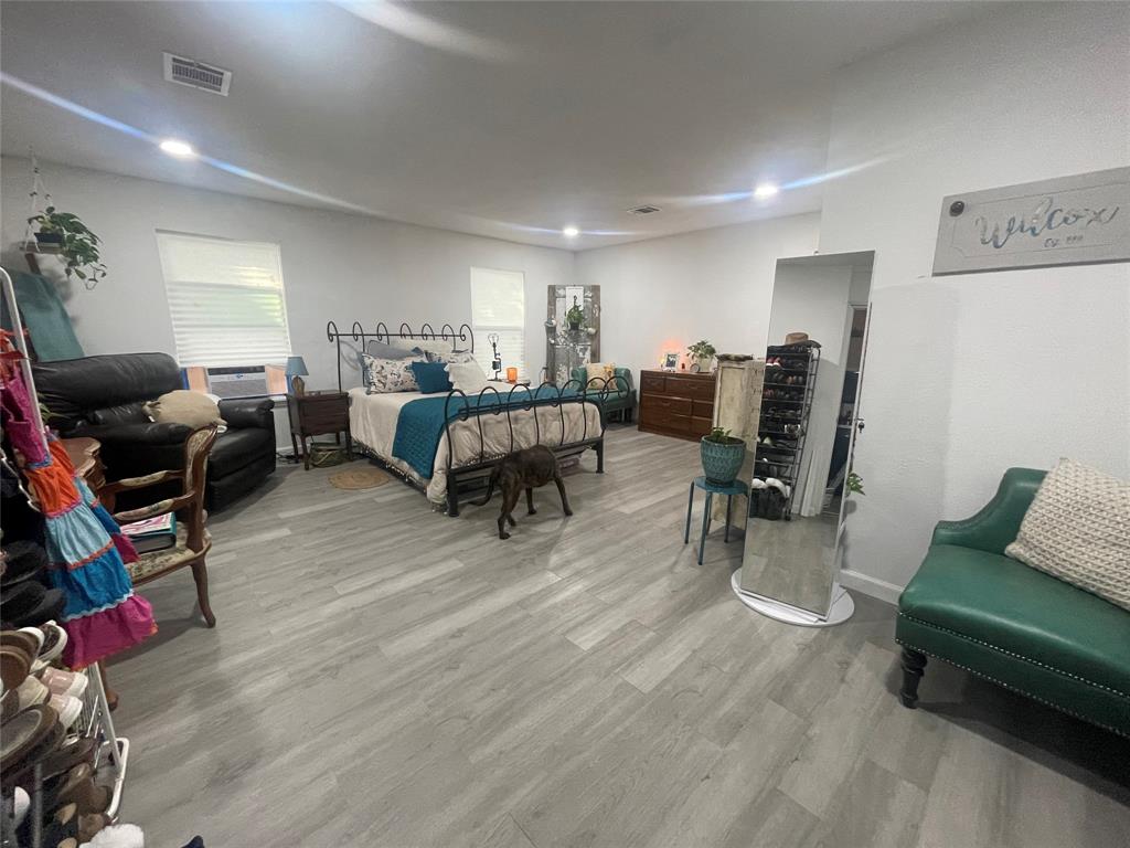 200 Austin Street Rice, TX 75155 - Photo 7 of 22 a living room with furniture and a wooden floor