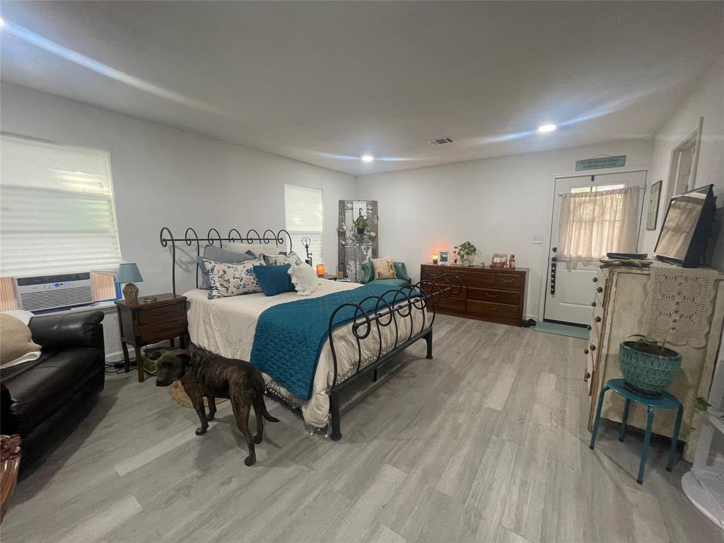 200 Austin Street Rice, TX 75155 - Photo 8 of 22 a bedroom with a bed and furniture