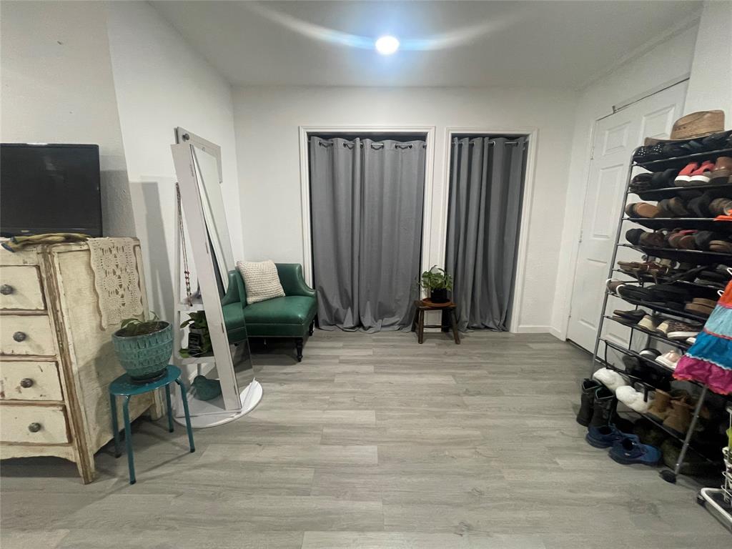 200 Austin Street Rice, TX 75155 - Photo 10 of 22 a living room with furniture and a flat screen tv