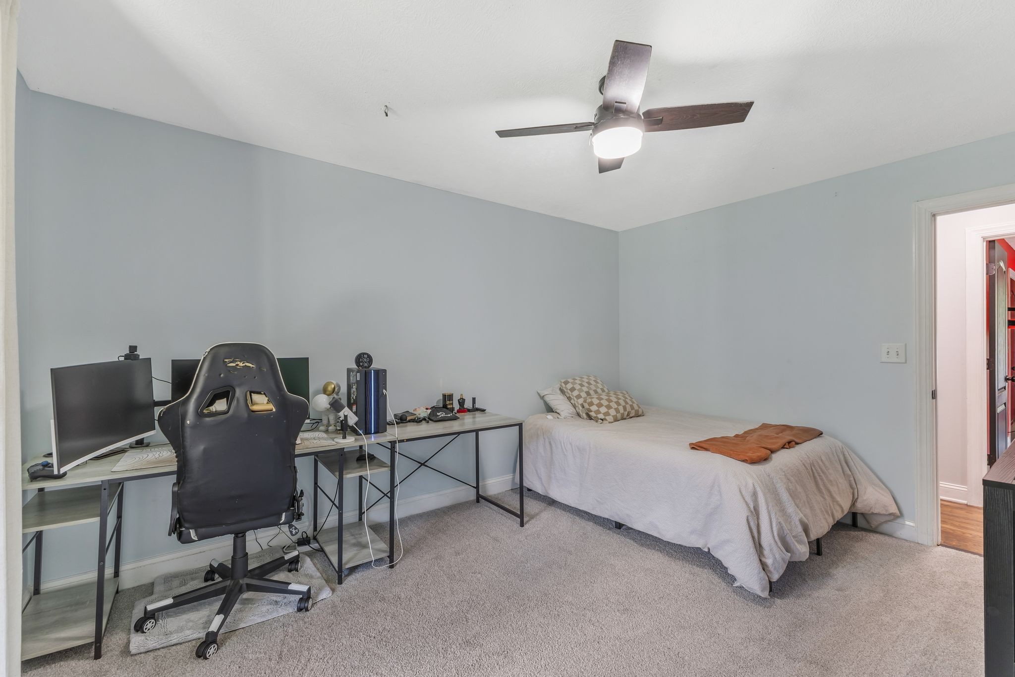 1745 Ennis Branch Road McEwen, TN 37101 - Photo 18 of 85 a bedroom with a bed chair and a chandelier