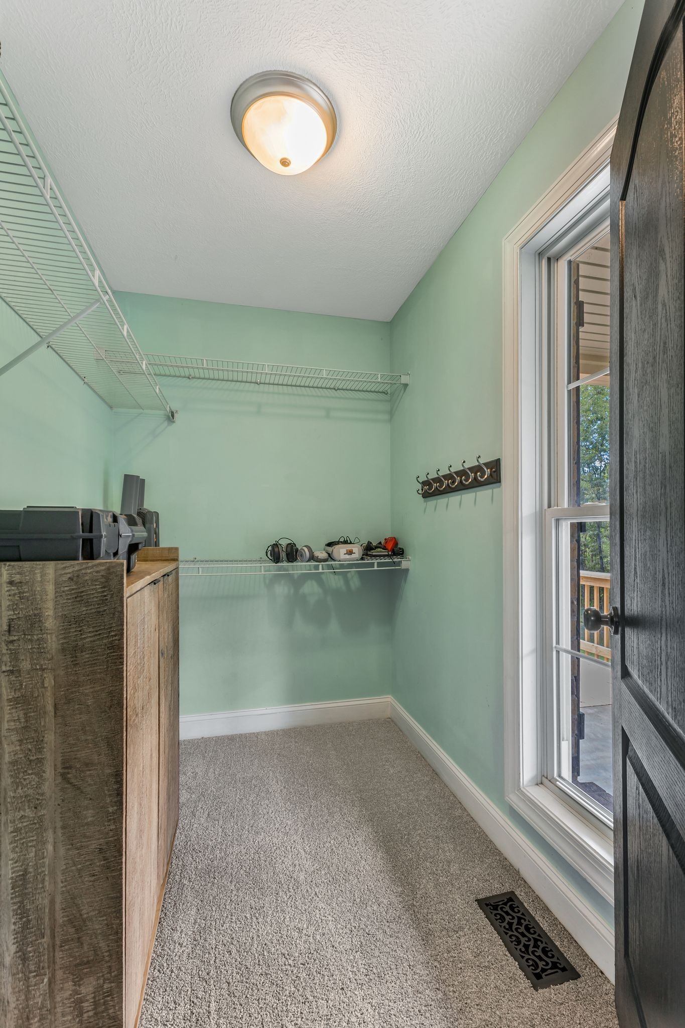 1745 Ennis Branch Road McEwen, TN 37101 - Photo 19 of 85 a view of a storage & utility room with a sink